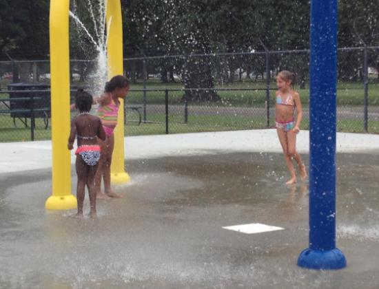 spraypad next to pool