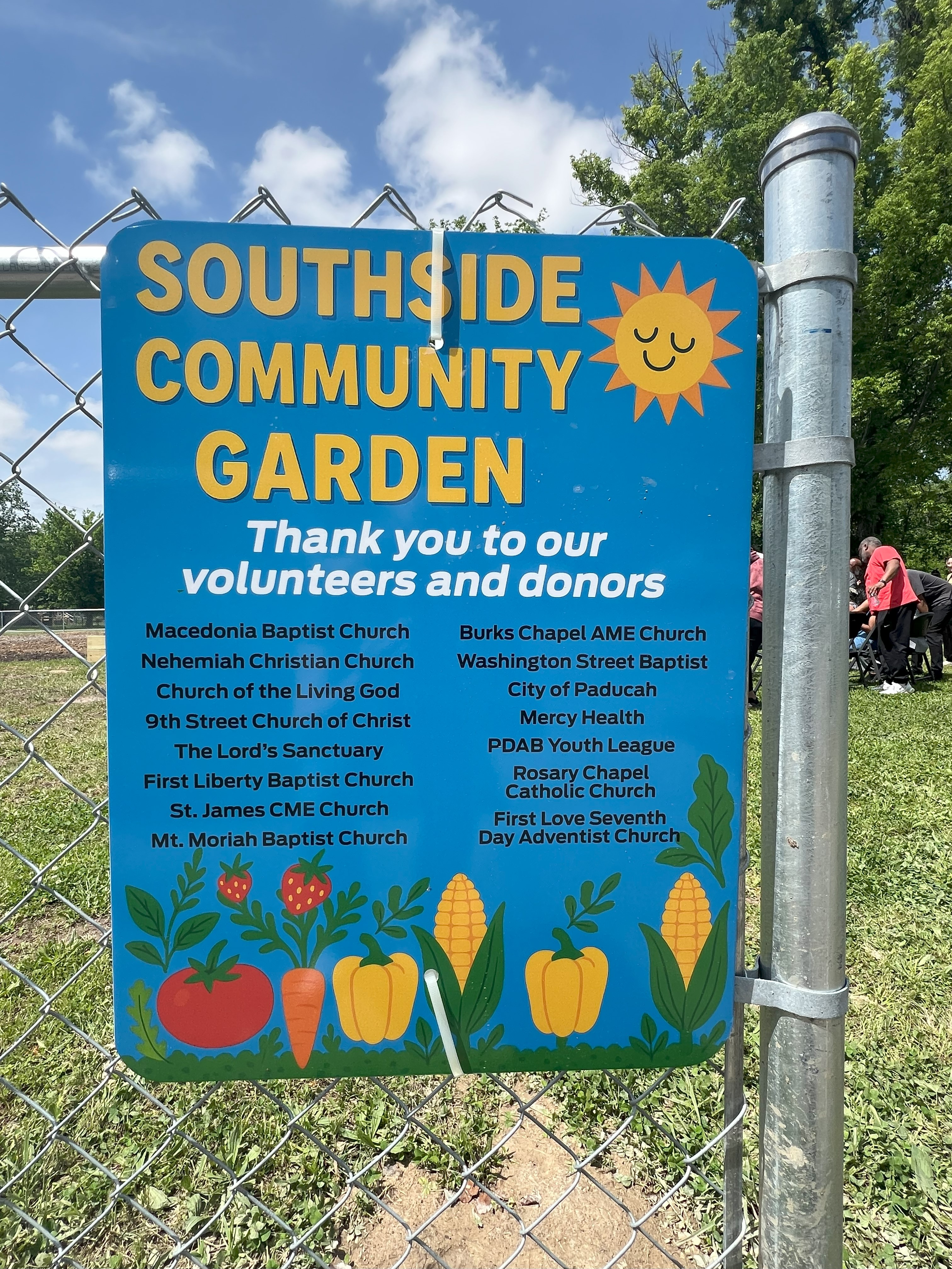 Southside Community Gardens Sign showing list of volunteers and donors